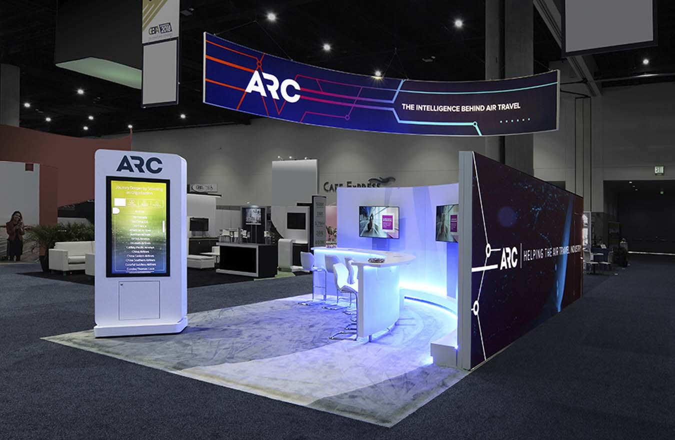 tradeshow booth with curved desk and lights