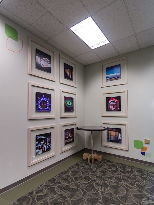 facilities-4 room corner with photos and small table